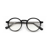 Óculos de grau Flux retrô redondo preto frontal